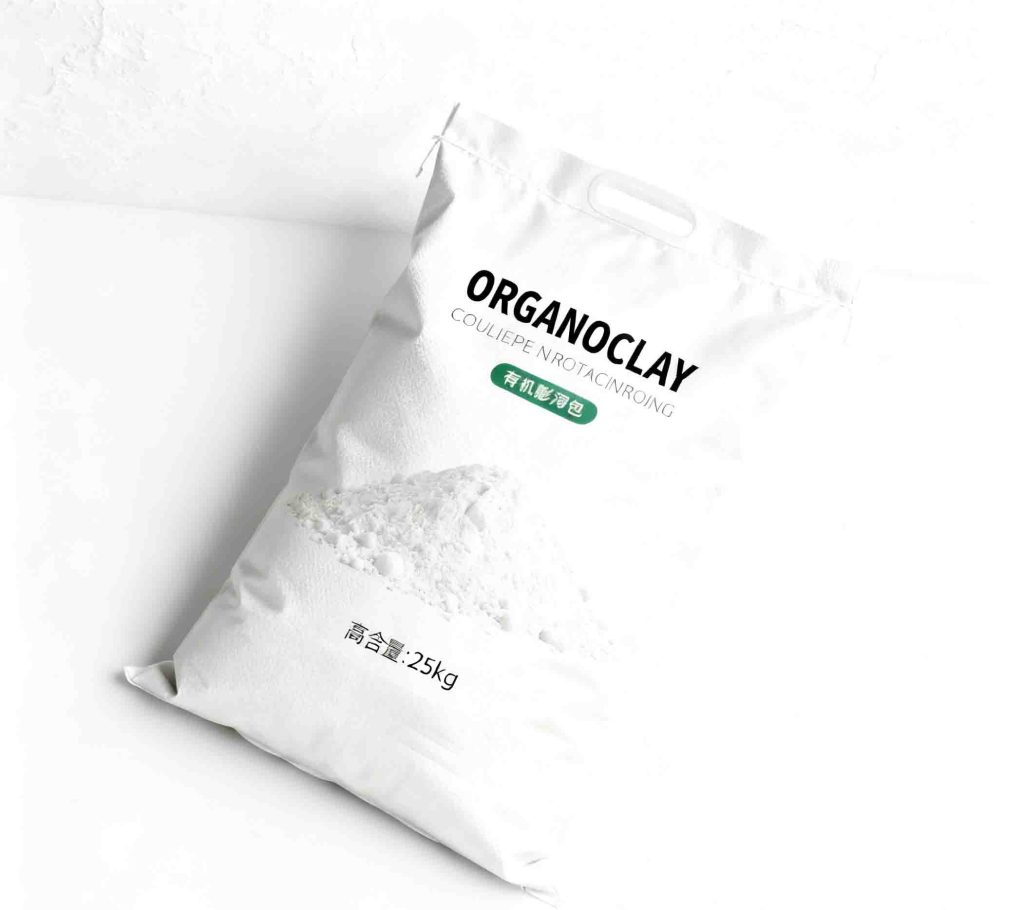 Organic clay to enhance coating viscosity recovery